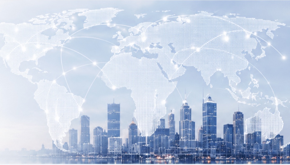 Illuminated world map connecting to a modern city skyline